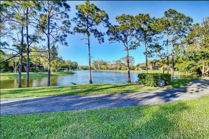 11750 Timbers Way Boca Raton, FL 33428 - Photo 19 of 25 a view of a park and trees with a big yard