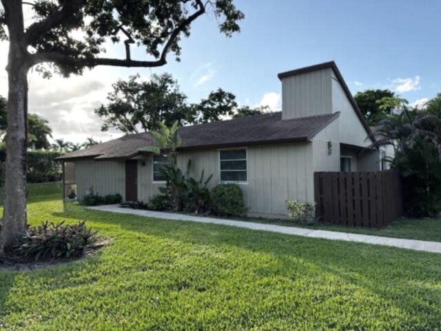 11750 Timbers Way Boca Raton, FL 33428 - Photo 2 of 25 a house view with a garden space