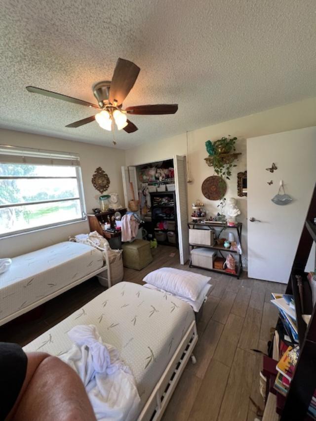 11750 Timbers Way Boca Raton, FL 33428 - Photo 9 of 25 a bedroom with bed and window