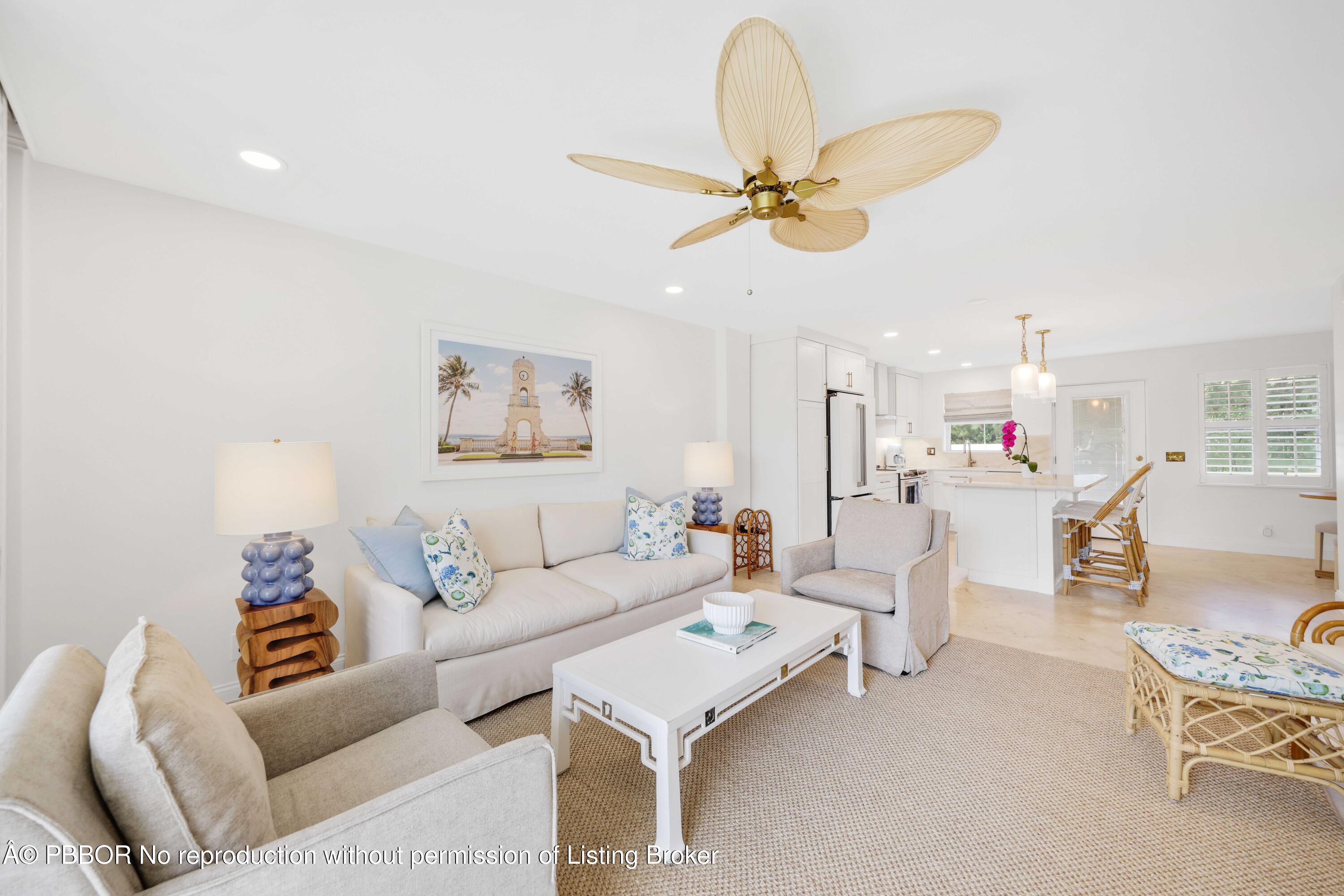 Undisclosed Address Palm Beach, FL 33480 - Photo 1 of 43 a living room with furniture and a chandelier