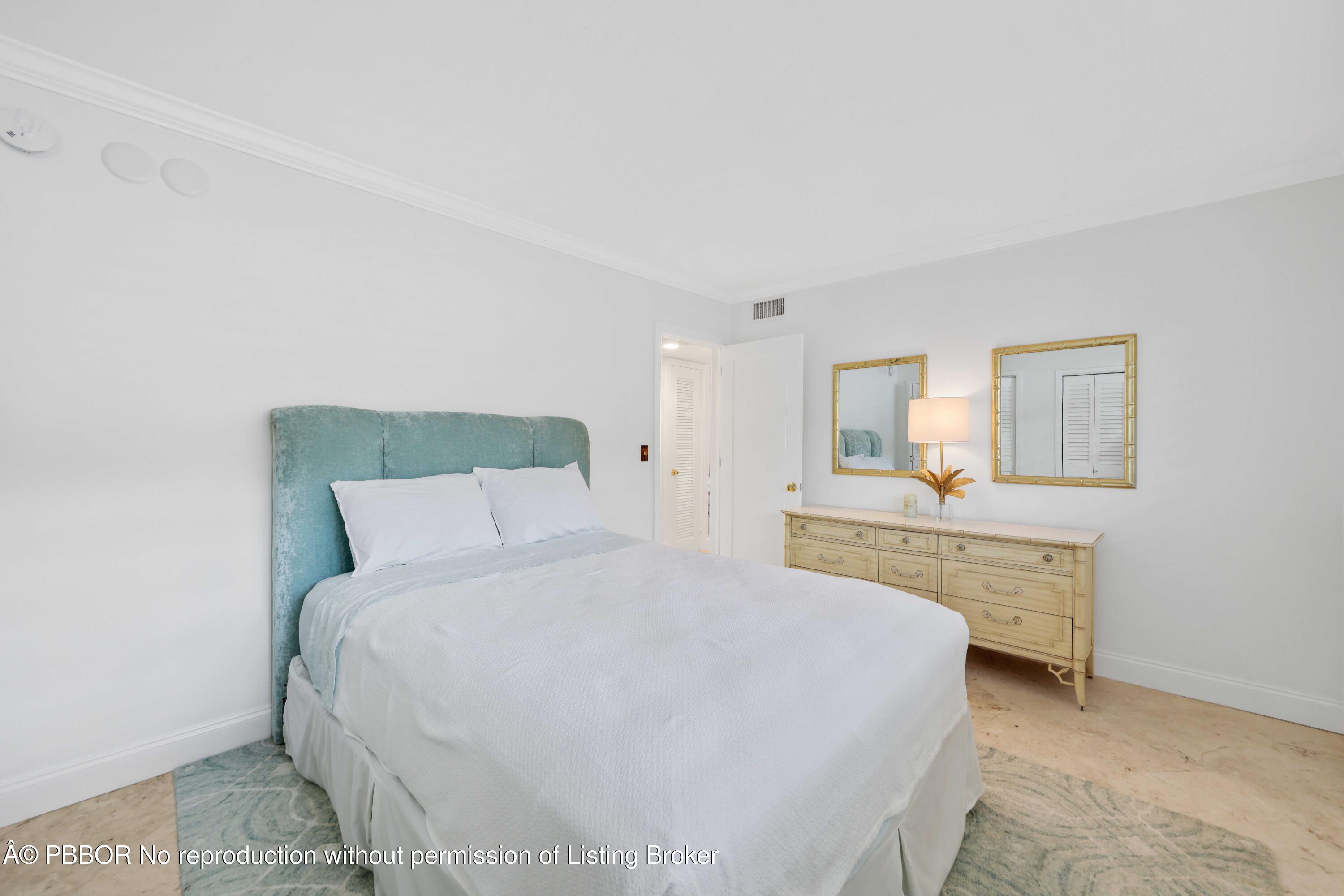 Undisclosed Address Palm Beach, FL 33480 - Photo 20 of 43 a large white bed in a white room