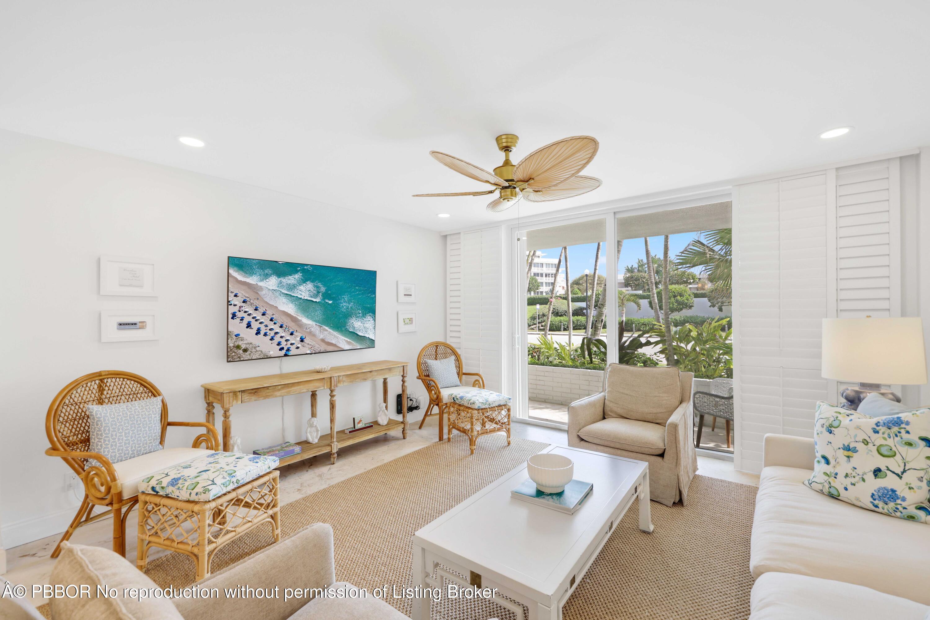 Undisclosed Address Palm Beach, FL 33480 - Photo 2 of 43 a living room with furniture and a large window