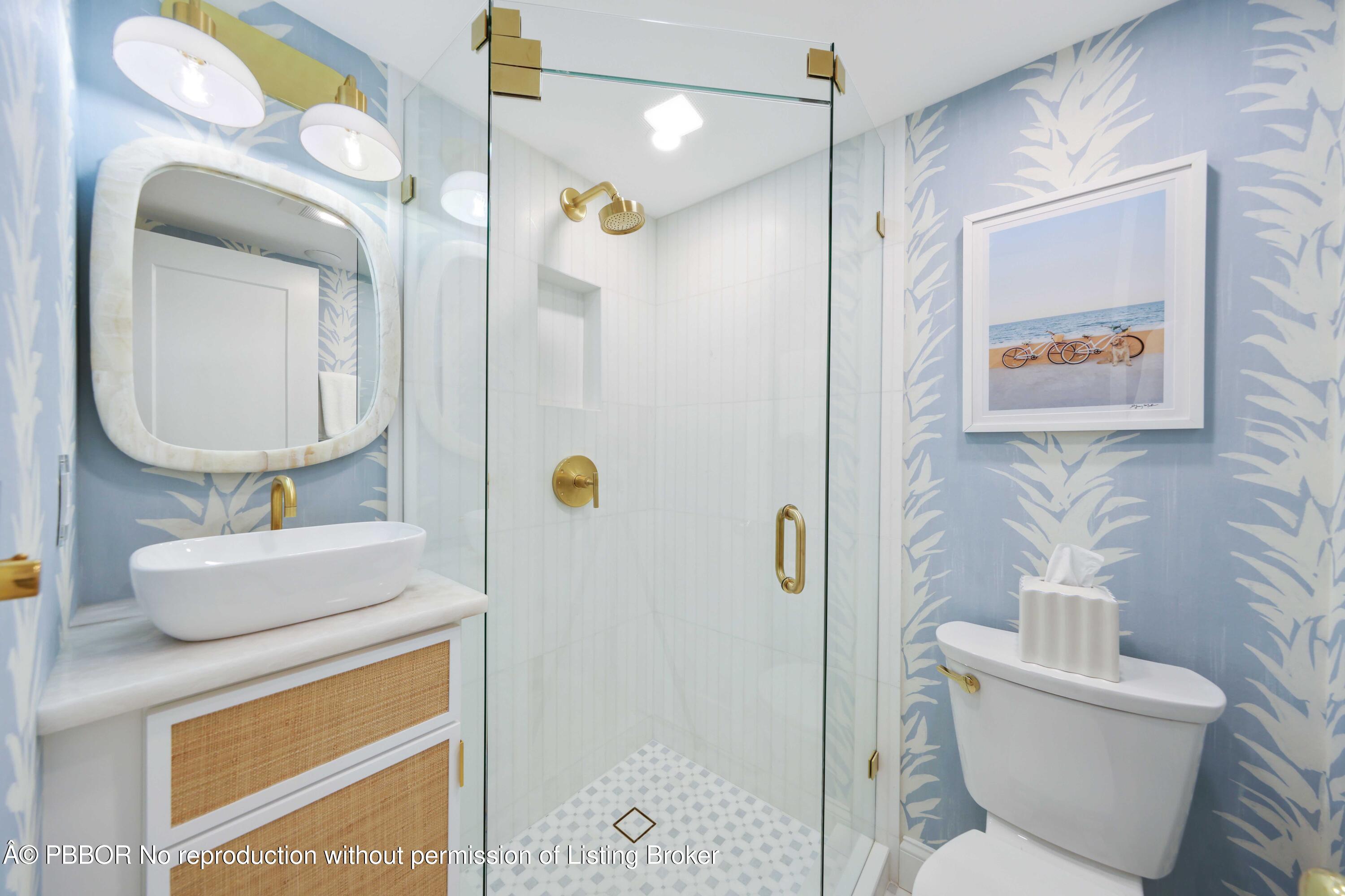 Undisclosed Address Palm Beach, FL 33480 - Photo 22 of 43 a bathroom with a sink a toilet and shower