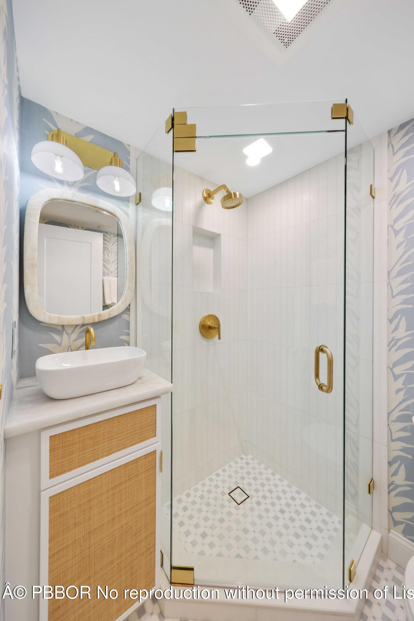 Undisclosed Address Palm Beach, FL 33480 - Photo 23 of 43 a bathroom with a granite countertop sink a mirror and a shower