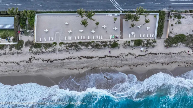 a view of a street with a building in the background