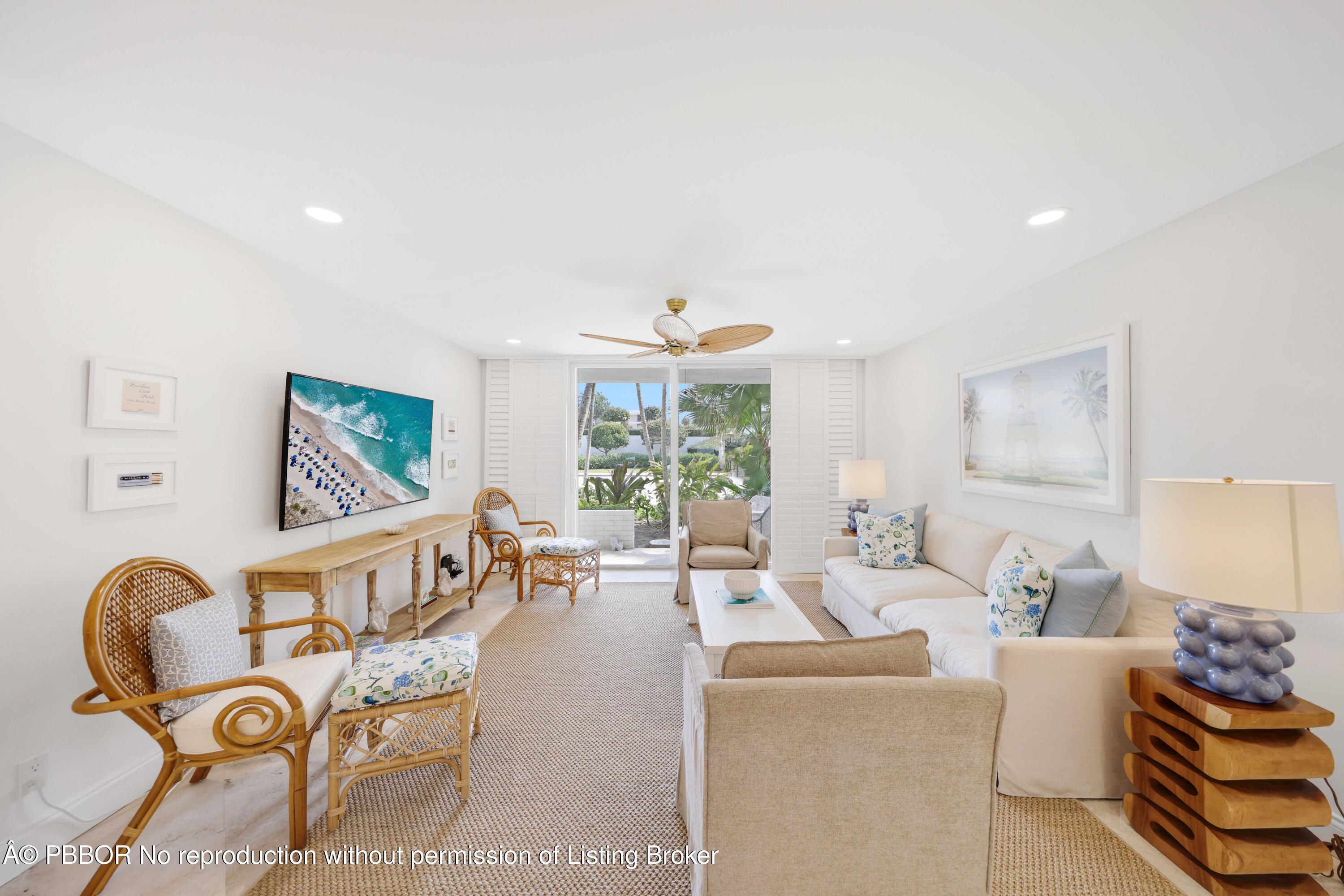 Undisclosed Address Palm Beach, FL 33480 - Photo 4 of 43 a living room with furniture and a large window