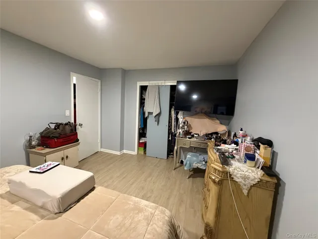 a room with furniture and a flat screen tv