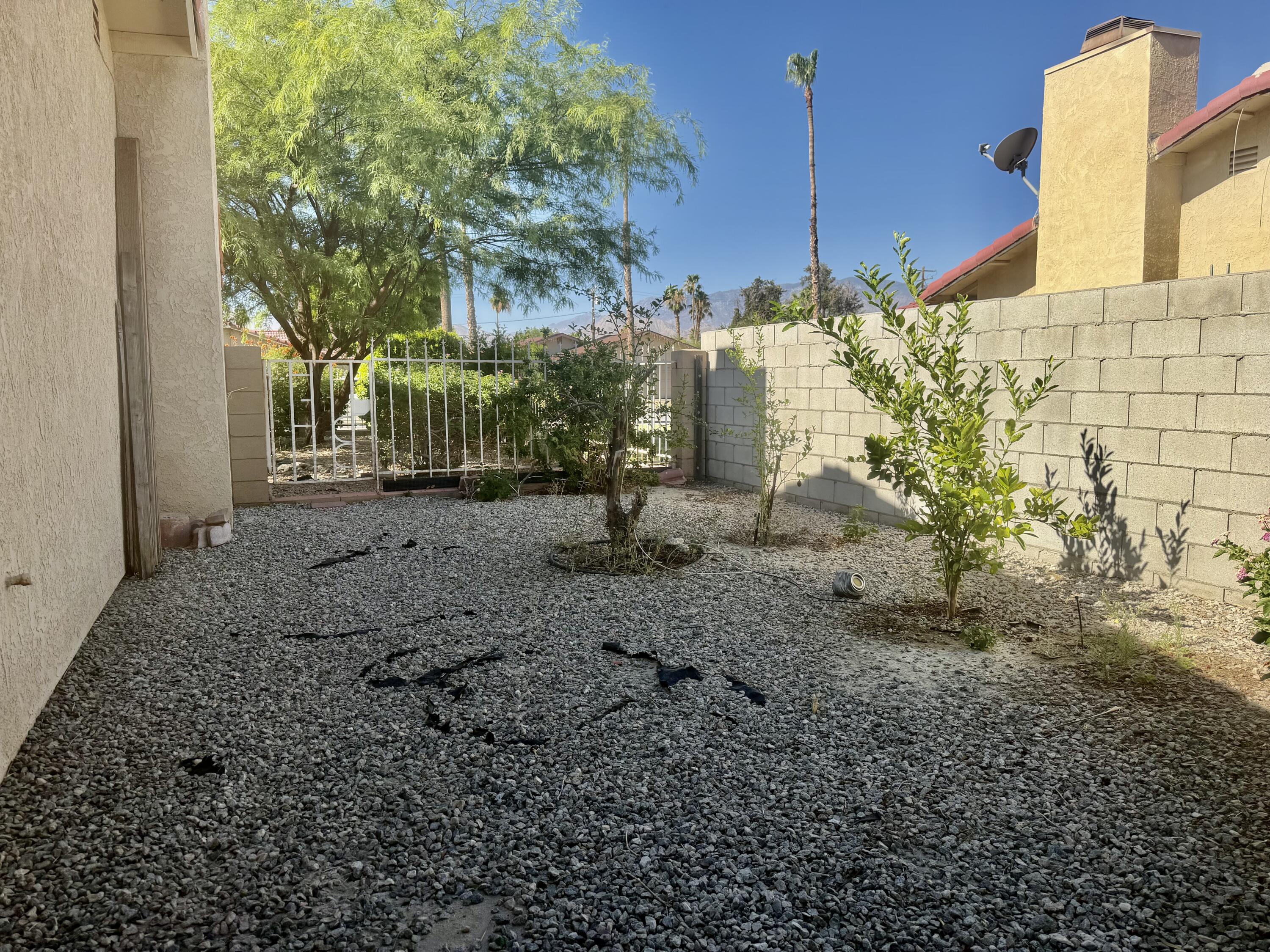 68110 Risueno Road Cathedral City, CA 92234 - Photo 27 of 29 side yard looking into frnt yard