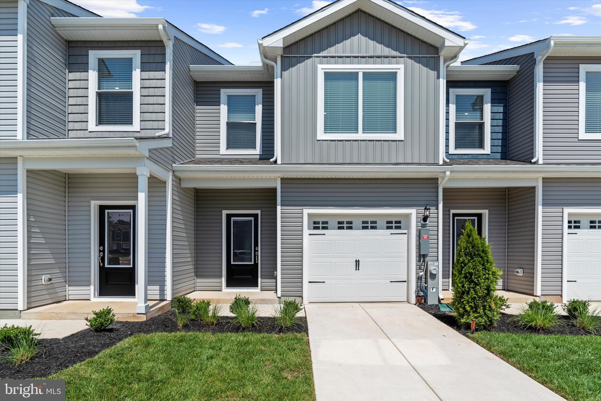 8131 Bartholomew Court Baltimore, MD 21206 - Photo 3 of 47 a front view of a house with garden