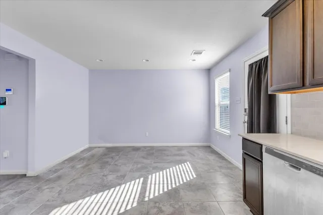 a view of staircase with white walls and white walls