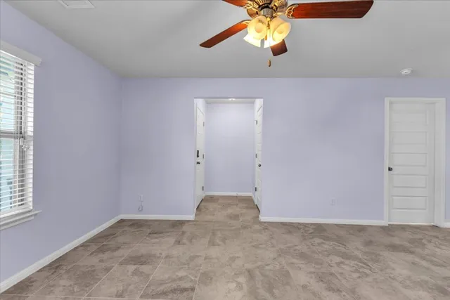 a view of a hallway with staircase