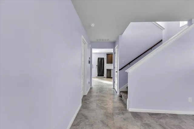 a bathroom with a sink toilet and a mirror
