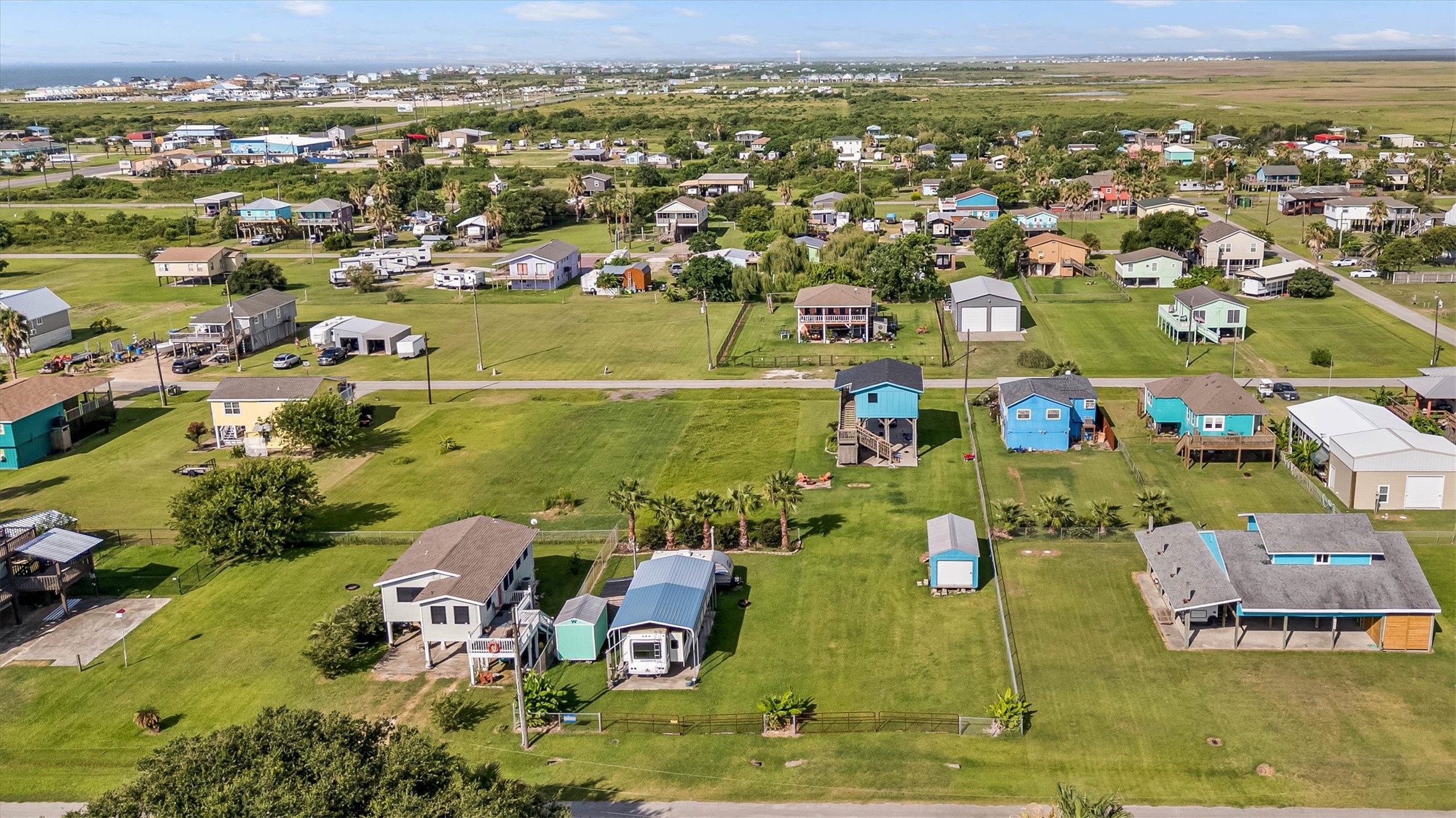 1061 E Road Port Bolivar, TX 77650 - Photo 19 of 28 an aerial view of residential houses with outdoor space