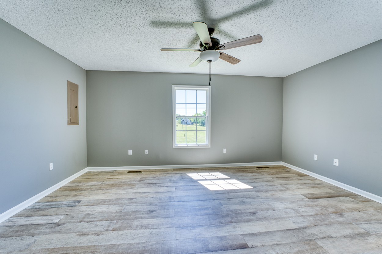 1464 Little Dry Creek Road Pulaski, TN 38478 - Photo 18 of 26 a view of an empty room with a window