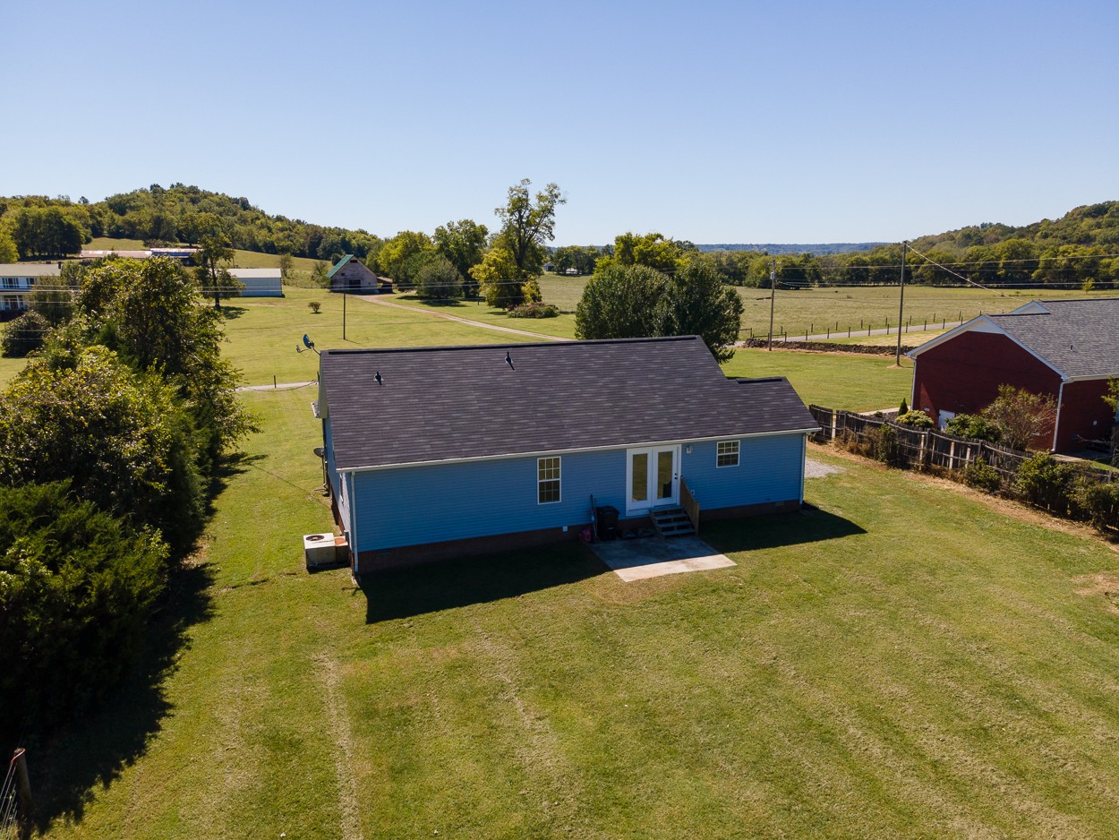 1464 Little Dry Creek Road Pulaski, TN 38478 - Photo 23 of 26 a aerial view of a house with a lake view