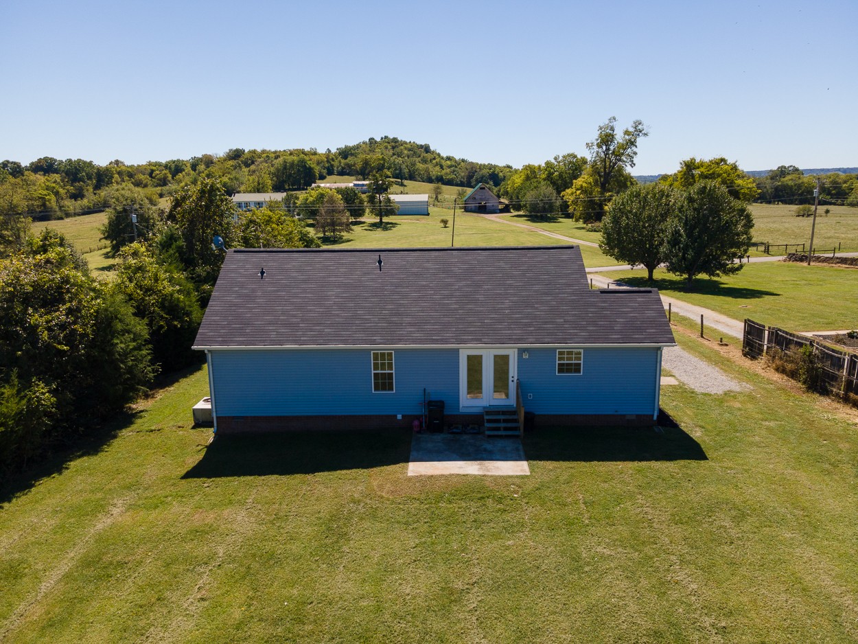 1464 Little Dry Creek Road Pulaski, TN 38478 - Photo 24 of 26 an aerial view of a house with a yard