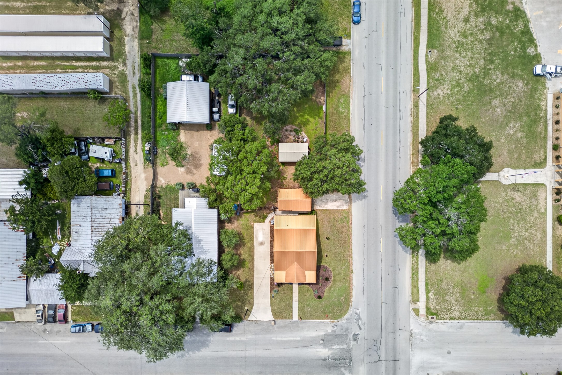 217 Walnut Avenue Luling, TX 78648 - Photo 38 of 38 aerial view of a house with a yard and potted plants