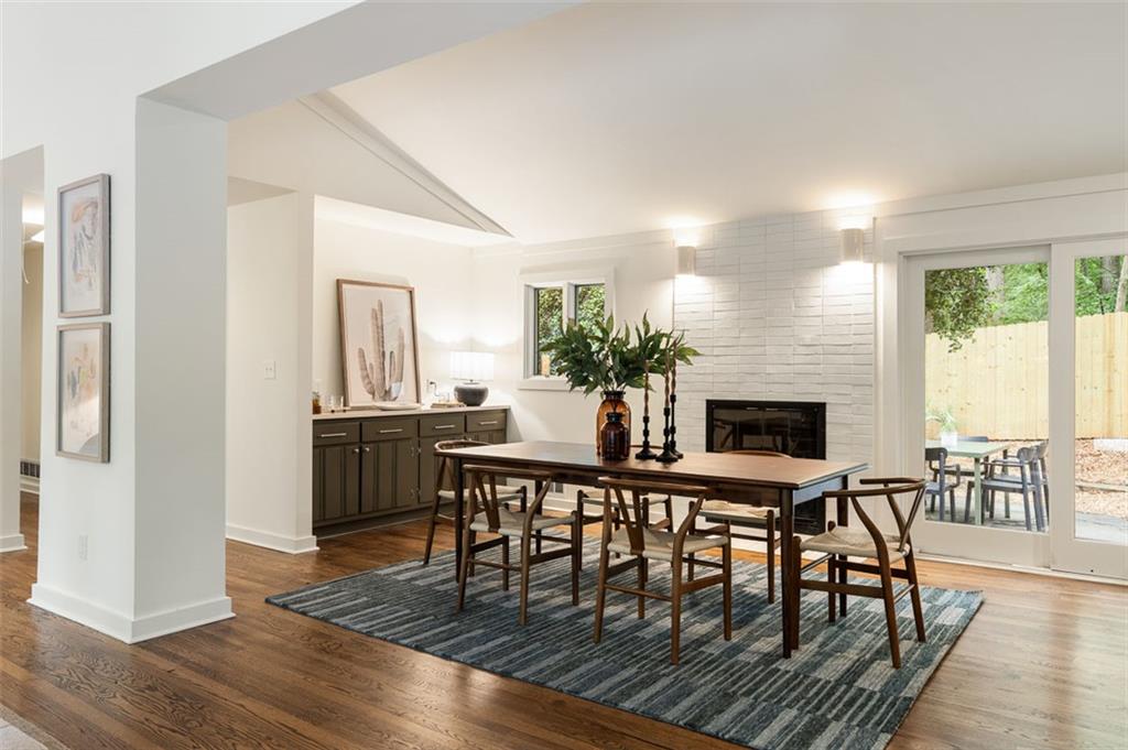 922 Barton Woods Road Northeast Atlanta, GA 30307 - Photo 35 of 96 a dining room with furniture window and wooden floor