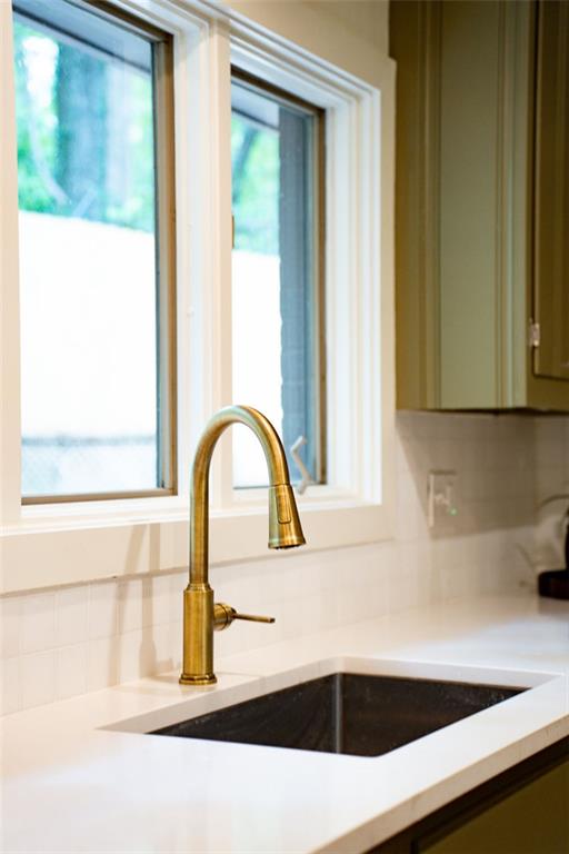 922 Barton Woods Road Northeast Atlanta, GA 30307 - Photo 44 of 96 a kitchen with a sink and a window