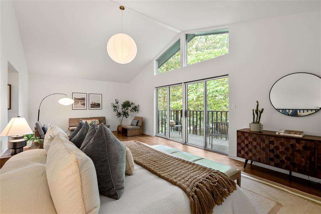 922 Barton Woods Road Northeast Atlanta, GA 30307 - Photo 70 of 96 a bedroom with bed and a window