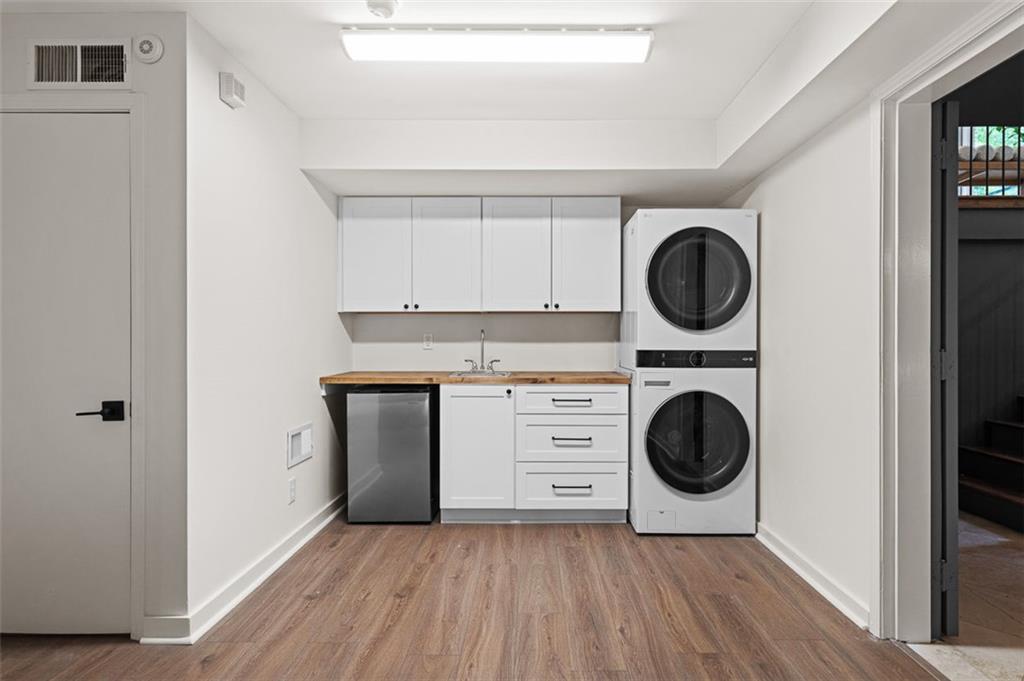 922 Barton Woods Road Northeast Atlanta, GA 30307 - Photo 84 of 96 a view of a kitchen with washer and dryer