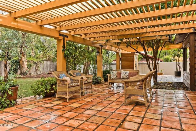 a garden view with a seating space