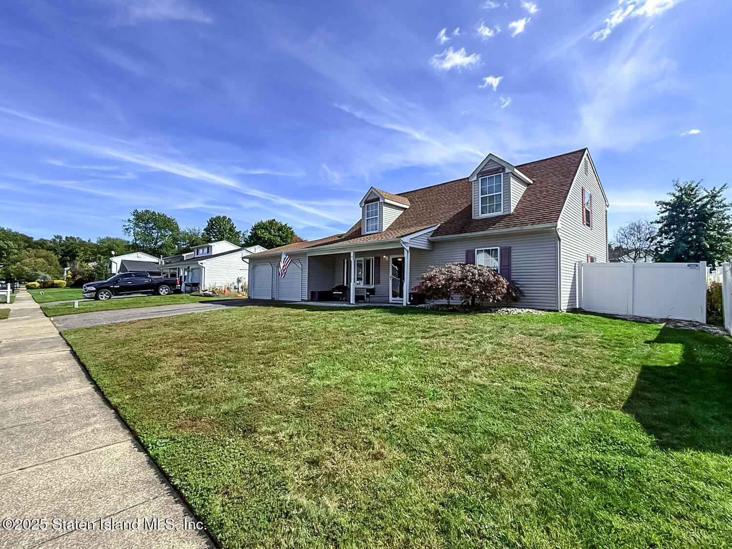 7 Cherry Bend Drive Howell, NJ 07731 - Photo 2 of 27 a front view of a house with a garden