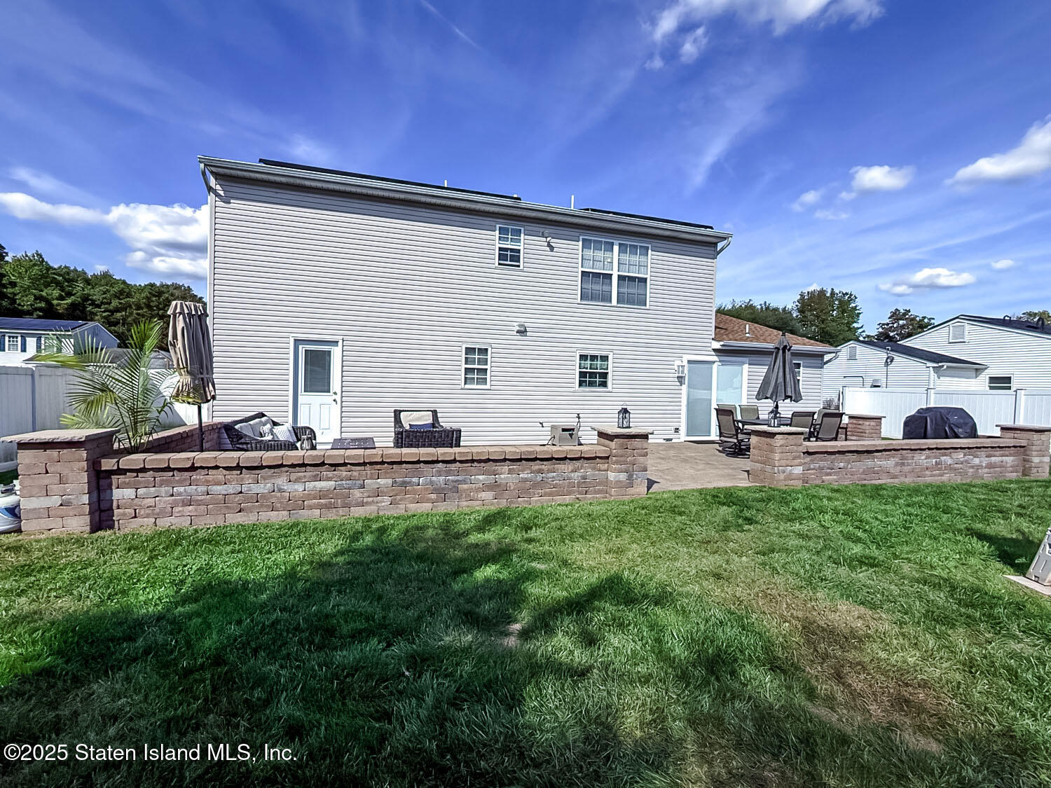 7 Cherry Bend Drive Howell, NJ 07731 - Photo 25 of 27 a view of a backyard with sitting area