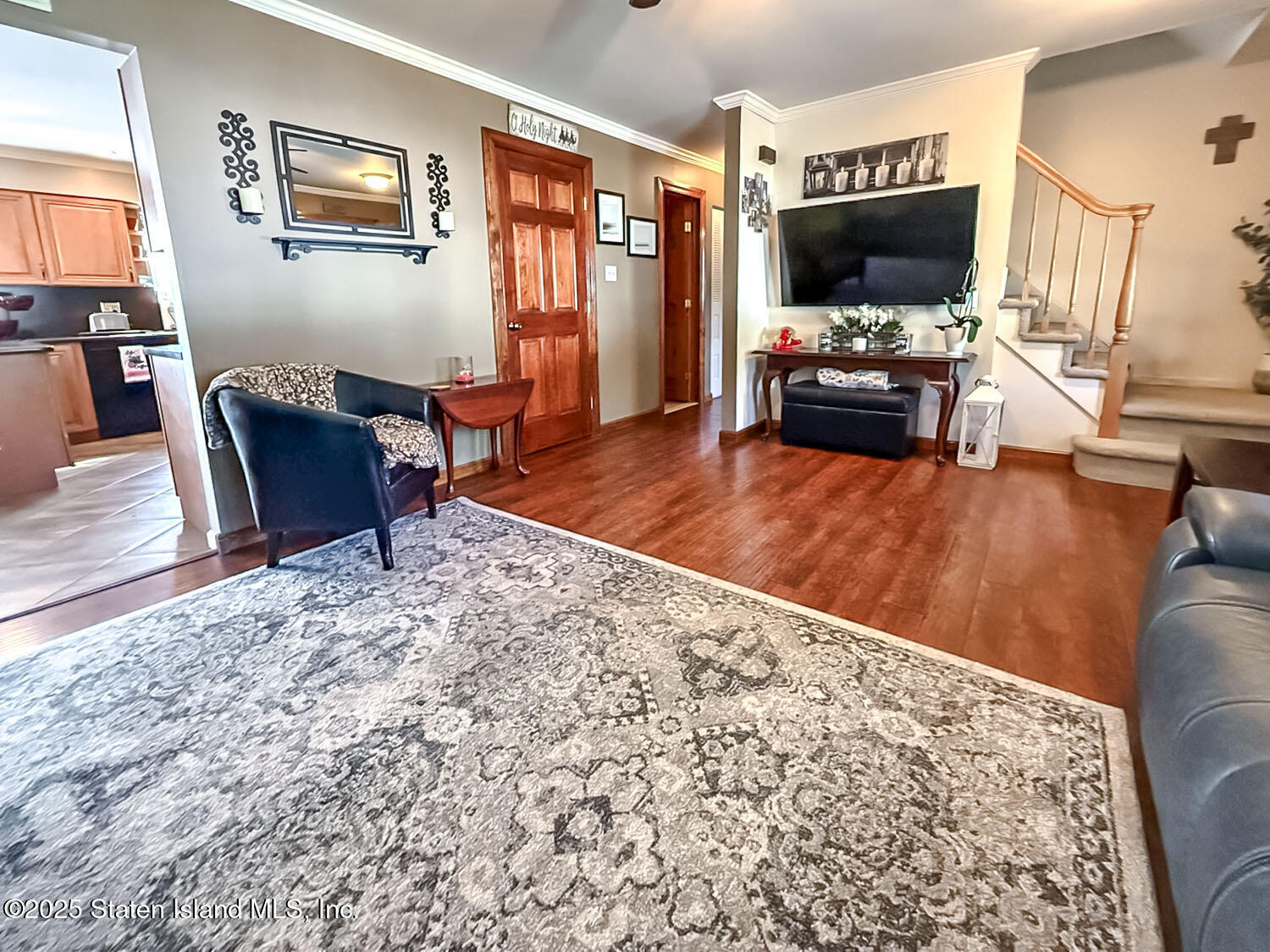 7 Cherry Bend Drive Howell, NJ 07731 - Photo 4 of 27 a living room with furniture and a flat screen tv