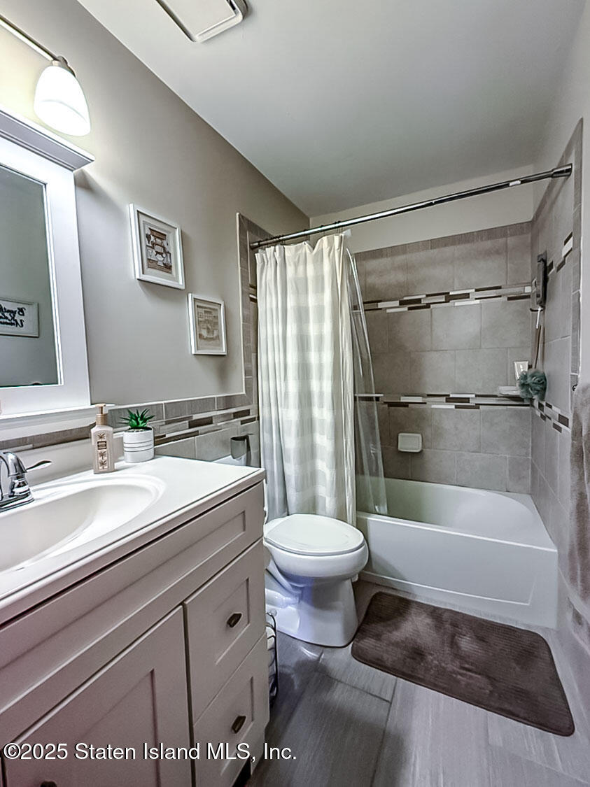 7 Cherry Bend Drive Howell, NJ 07731 - Photo 9 of 27 a bathroom with a sink toilet and shower