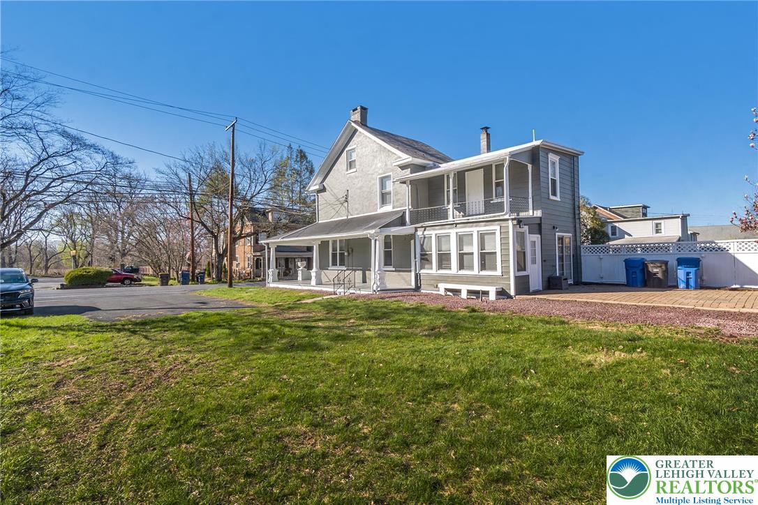 2213 Village Road Orefield, PA 18069 - Photo 32 of 41 a front view of a house with a garden