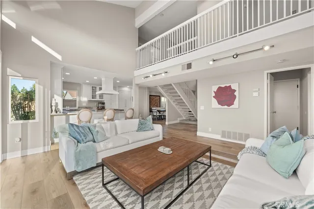 a living room with furniture and a table