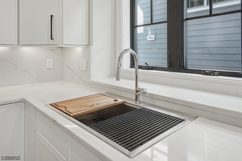 27 Willow Street, Unit A Millburn, NJ 07041 - Photo 17 of 50 a close view of a sink and a stove
