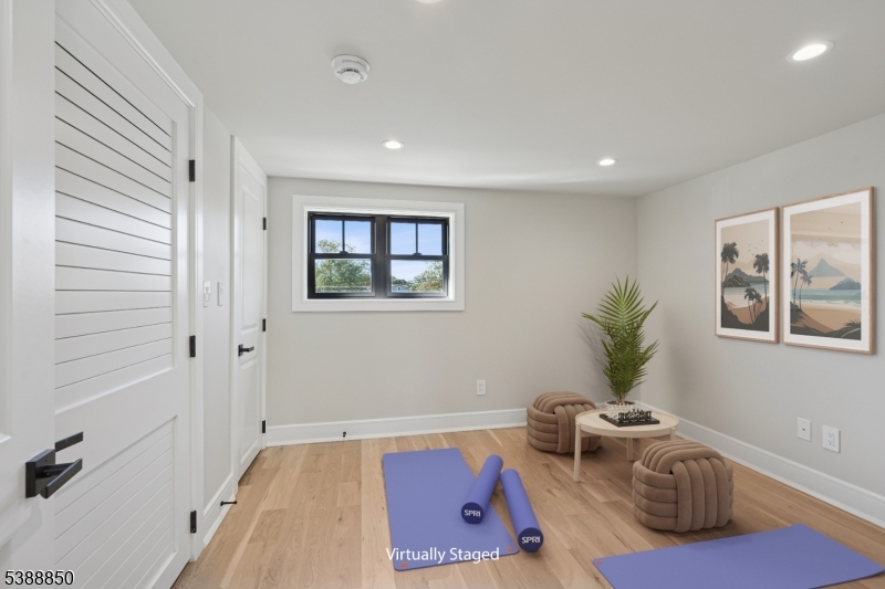27 Willow Street, Unit A Millburn, NJ 07041 - Photo 40 of 50 a hallway with furniture and window