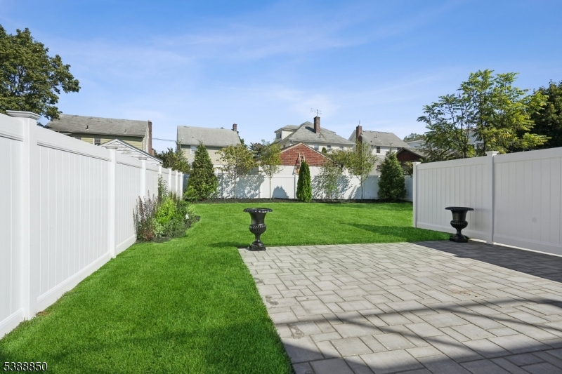 27 Willow Street, Unit A Millburn, NJ 07041 - Photo 47 of 50 a view of a house with a yard