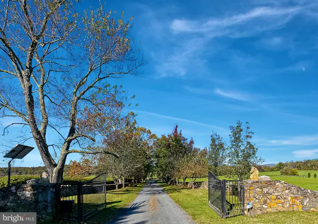 a view of a golf course with a field