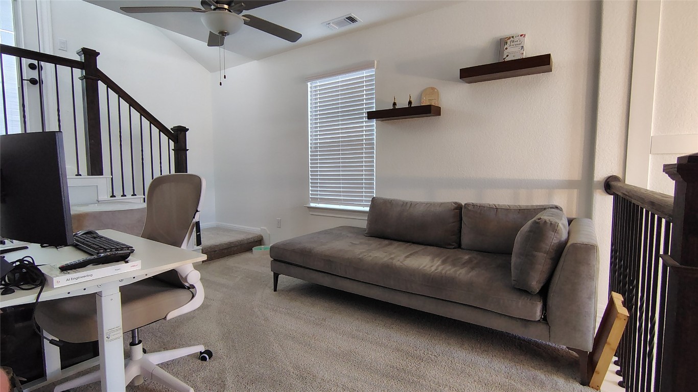 316 Turnbuckle Bend Leander, TX 78641 - Photo 15 of 21 a living room with furniture and a window