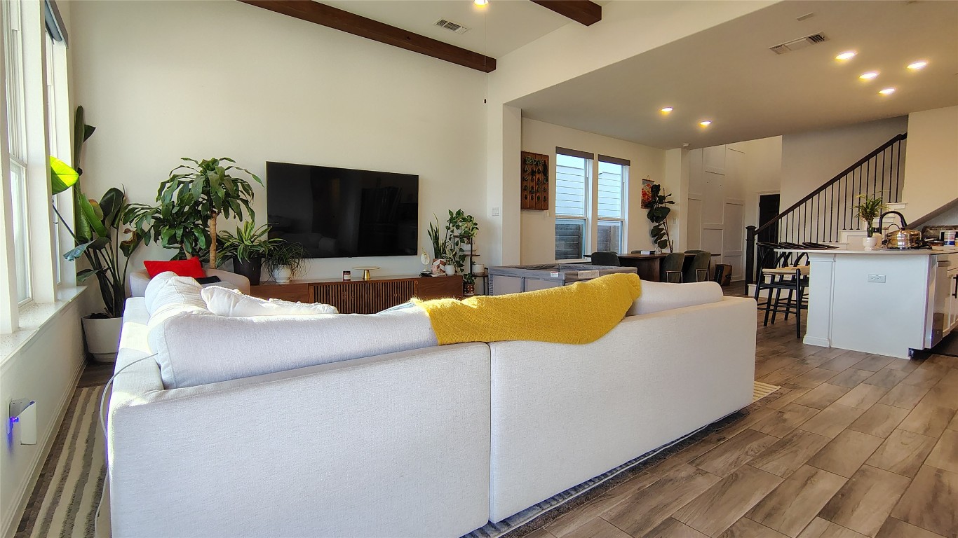 316 Turnbuckle Bend Leander, TX 78641 - Photo 8 of 21 a living room with furniture and a flat screen tv