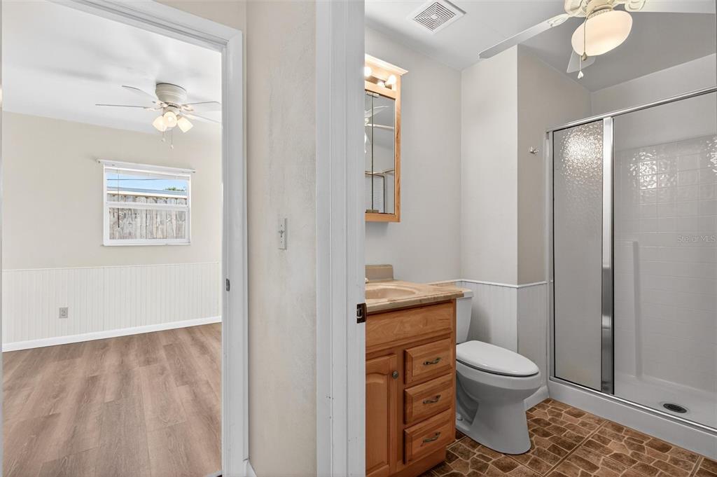 47 Carol Road Ormond Beach, FL 32176 - Photo 12 of 54 a bathroom with a toilet a sink and shower