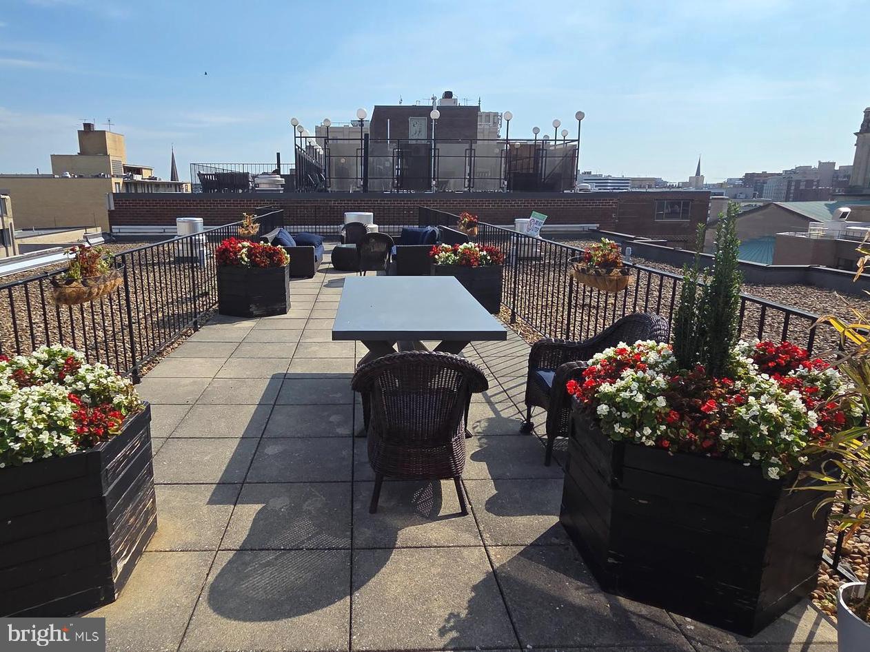 1440 N Street Northwest, Unit 1011 Washington, DC 20005 - Photo 8 of 14 a view of a city with flowers