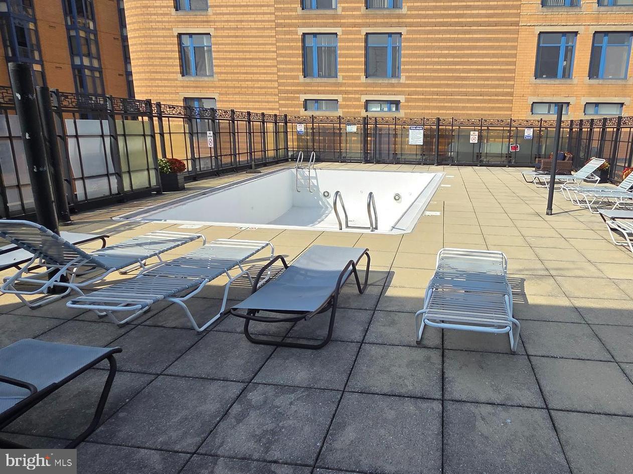 1440 N Street Northwest, Unit 1011 Washington, DC 20005 - Photo 10 of 14 a view of outdoor space with seating
