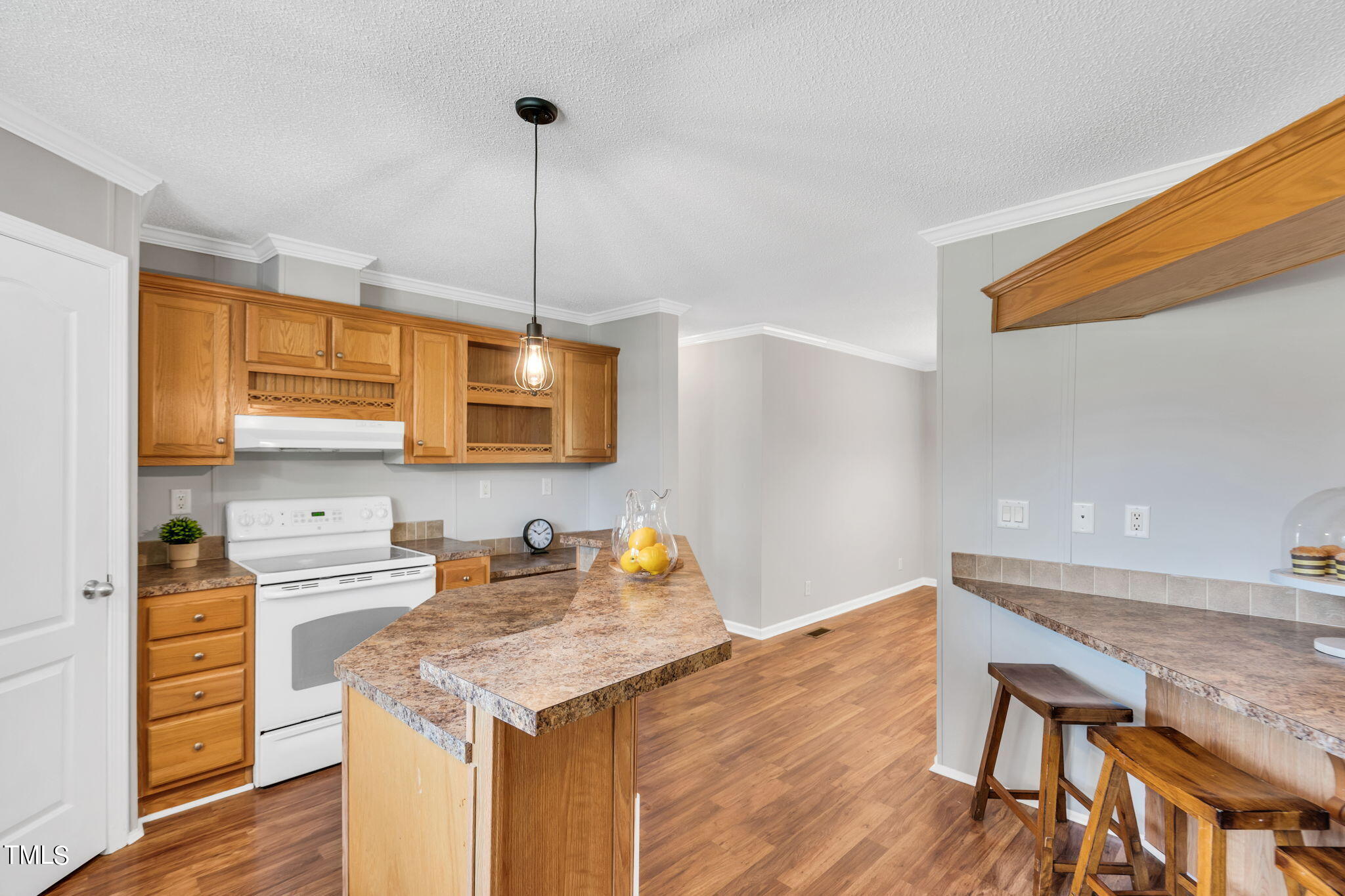 4711 Wheels Hill Road Durham, NC 27705 - Photo 22 of 67 Bar height AND counter height areas for eating areas