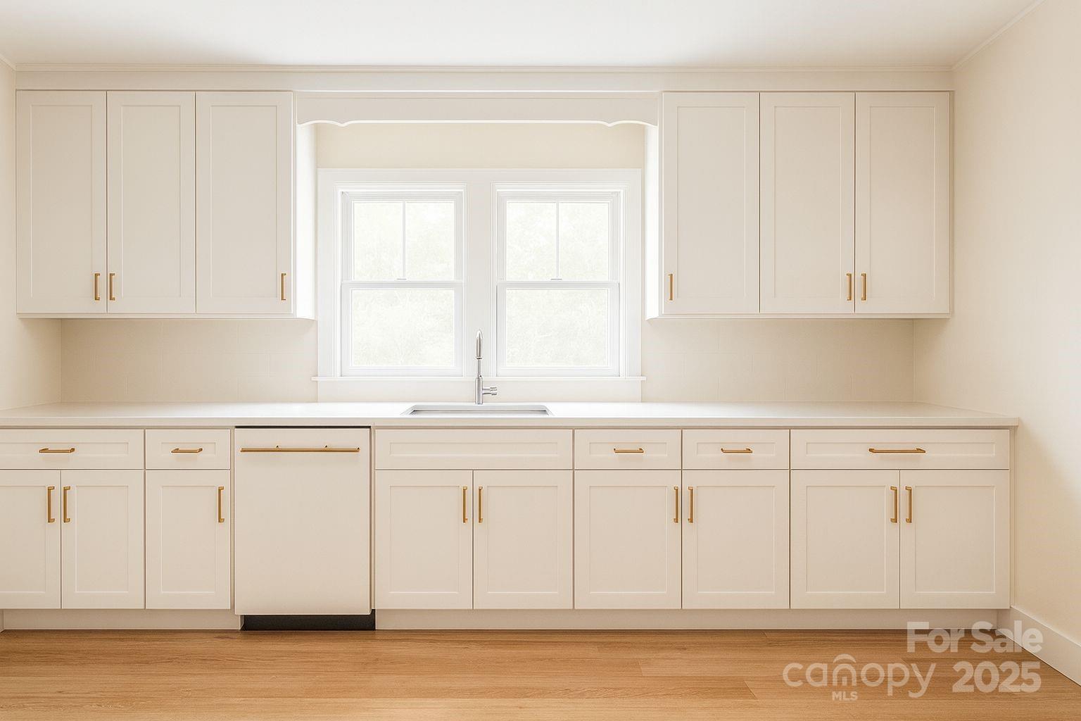 17837 Porter Hill Road Norwood, NC 28128 - Photo 18 of 37 a kitchen with stainless steel appliances white cabinets and a window