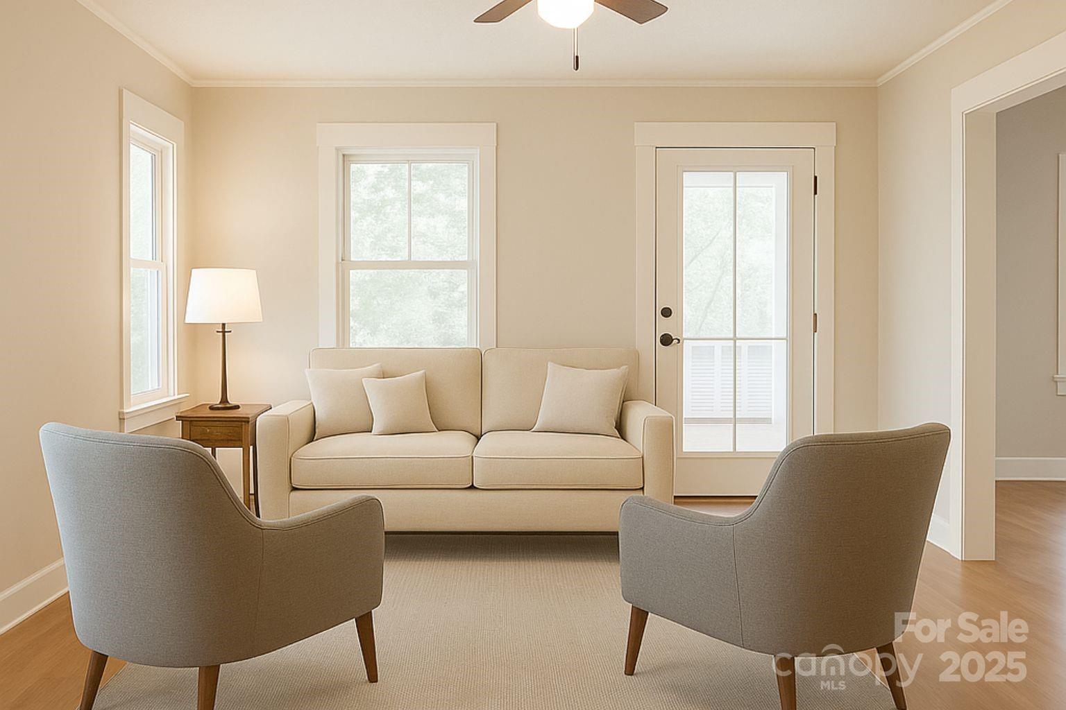 17837 Porter Hill Road Norwood, NC 28128 - Photo 26 of 37 a living room with furniture a lamp and a window