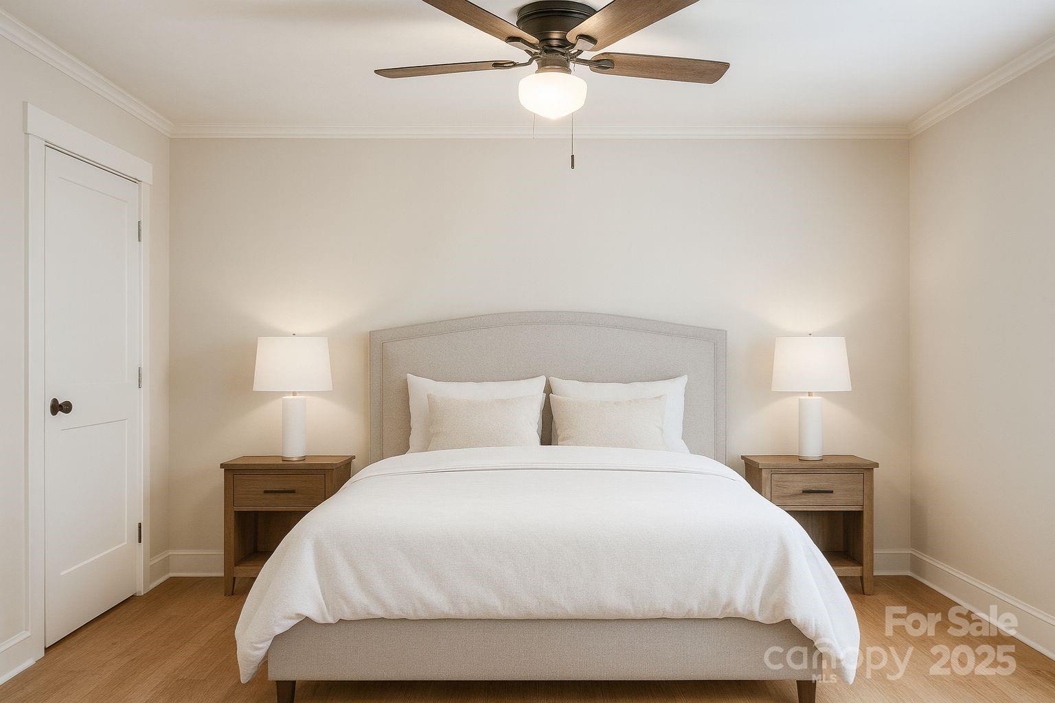 17837 Porter Hill Road Norwood, NC 28128 - Photo 32 of 37 a bedroom with a bed and a ceiling fan