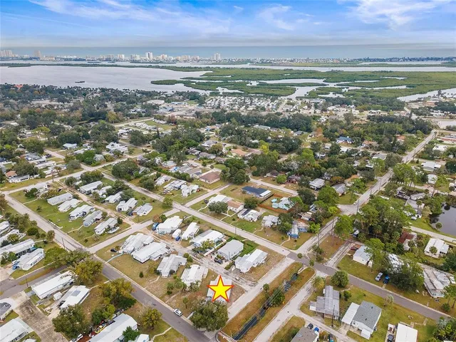 a view of city with ocean