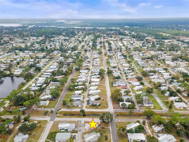 an aerial view of residential building with parking space