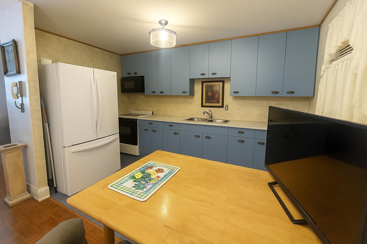 1140 Clinton Street Gary, IN 46406 - Photo 3 of 8 a kitchen with a refrigerator and a sink