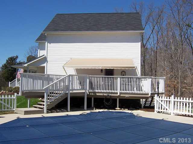 646 Mereva Road Smyrna, SC 29743 - Photo 4 of 15 a view of a house with wooden deck