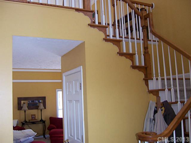 646 Mereva Road Smyrna, SC 29743 - Photo 5 of 15 a view of stairs and hall with wooden floor